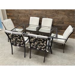 Metal framed garden table with glazed top (W170cm, D102cm, H71cm) and six armchairs with cushions 