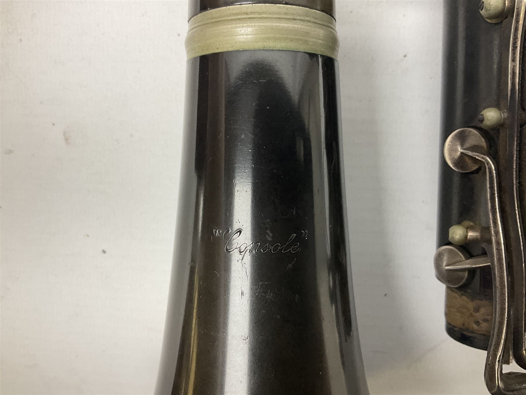 Windsor five-piece clarinet, serial no.EK05580; and Selmer Console clarinet with B&H mouth-piece; both cased (2)