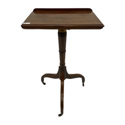 Early 19th century mahogany reading table, the angle adjustable moulded top over ring turned column and raised on three inverted splayed supports with castors
