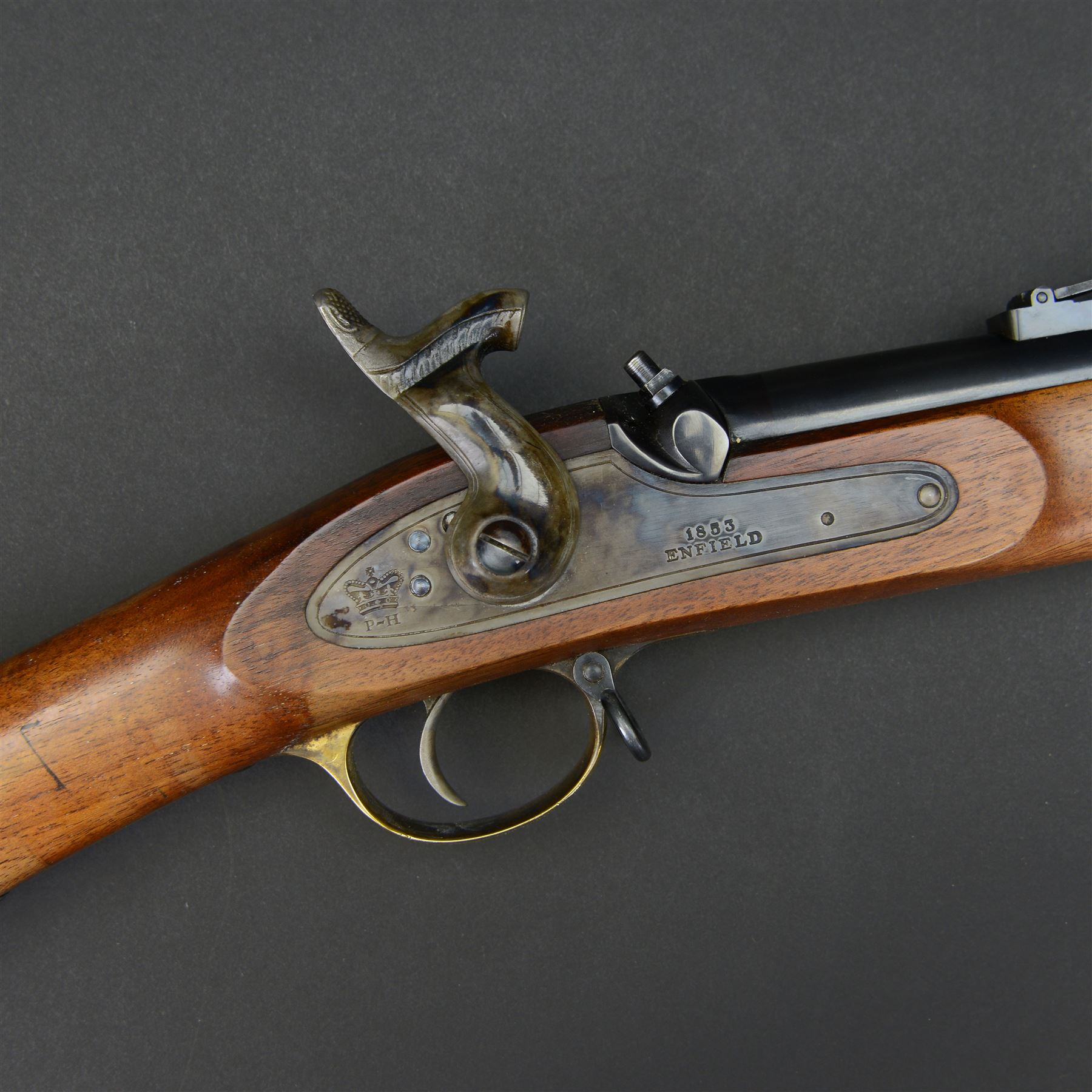 SECTION 1 FIREARMS CERTIFICATE REQUIRED - Parker Hale reproduction 1853 Enfield muzzle loading rifle, the 99cm barrel marked Parker-Hale Ltd, Birmingham England, fitted with ladder sight, secured by three bands, the lock plate marked Enfield 1853, with crowned PH, full stock with ramrod under, overall L140cm, serial no.6567 
