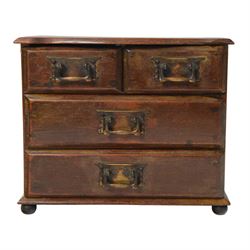 Table top chest of drawers, of rectangular form, with two short and two long drawers, rais...