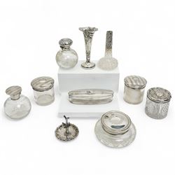 Four silver mounted dressing table items including globe scent flask and three silver moun...