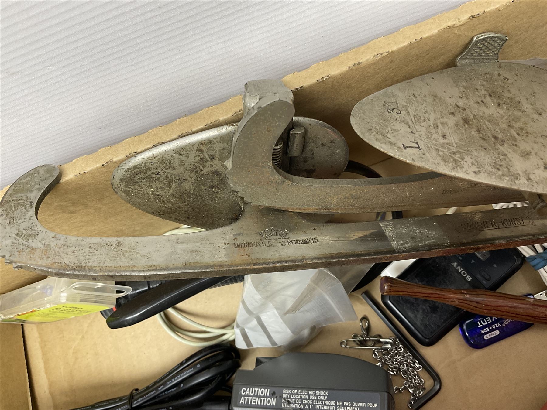 Daiwa 7700A fishing real, together with ice skate blades, pen nibs and other collectables 