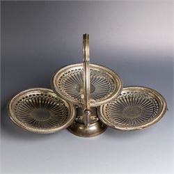 Indian silver folding cake stand, of circular form with pierced decoration, loop handle and circular foot, when folded H18cm
