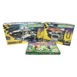 Scalextric - Formula One set with McLaren Mercedes and Williams BMW cars; and Speed Extreme set with Ford Focus cars; both boxed with accessories and paperwork; and Parker Pro-Action football game; boxed (3)