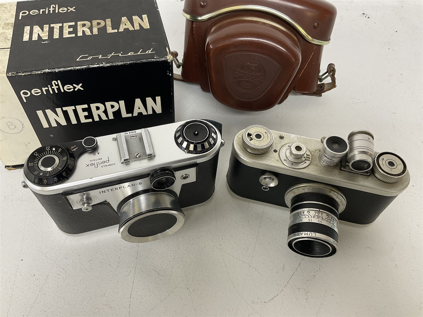 Corfield Periflex I 35mm periscope camera body,  with 'Corfield Lumar-X 1:3,5/50' lens, and Corfield Interplan-B camera body, serial no. 9111482 in original box, and with ready case