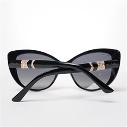 Bulgari - pair of oversized cat-eye sunglasses, with gradient tinted lenses in a black frame, the temples and arms with gold-tone hardware inset with pave-jewelled hinge detail, with original cloth pouch, hard leather case and box