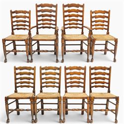 Set of eight country ladderback chairs (6+2), shaped ladderback over a rush seat, raised o...