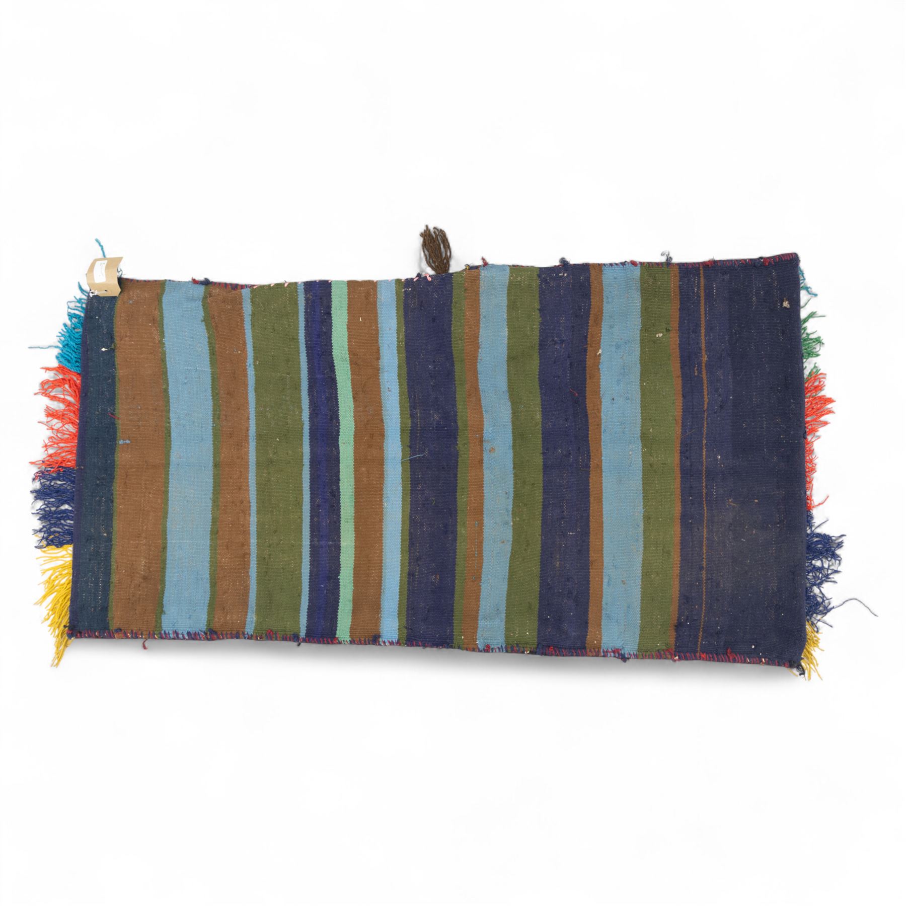 North East Persian Turkoman saddle bag, flatwoven wool with striped field of multicoloured diamond motifs, flanked by geometric borders in crimson and indigo, joined at centre with original braided fastening