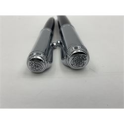 Acqua Di Parma for Aurora fountain pen, the black barrel with chrome mounts and cap, and white gold nib stamped 14K, together with a matching ballpoint pen, L13.5cm (2)