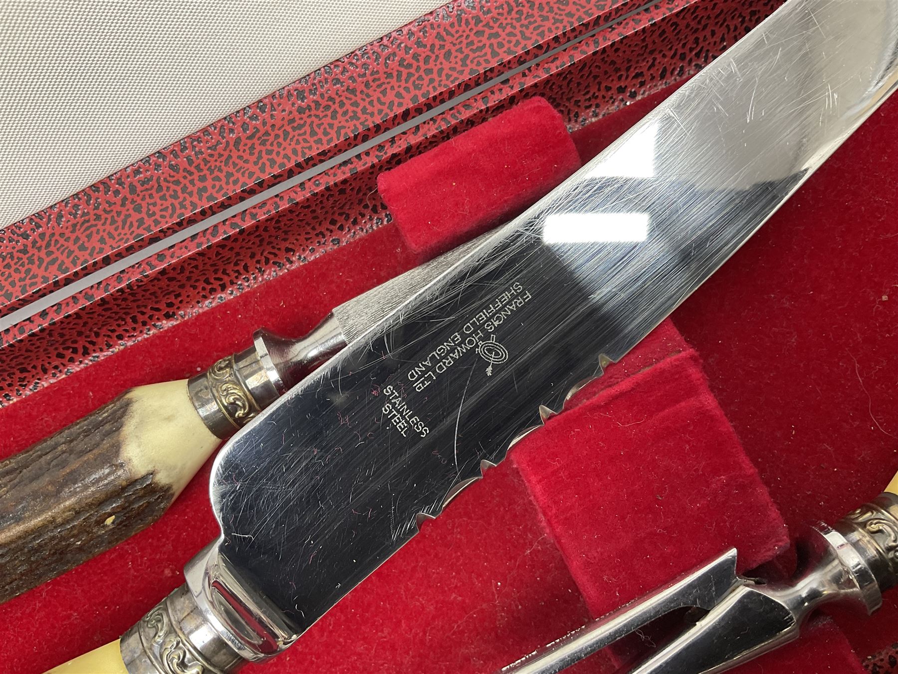 Silver plated Calibri lighter, in the form of a twin handled vase with mask handles, together with a pair of silver plated candle sticks, horn handled carving set with hallmarked silver ferrules and other silver plated items