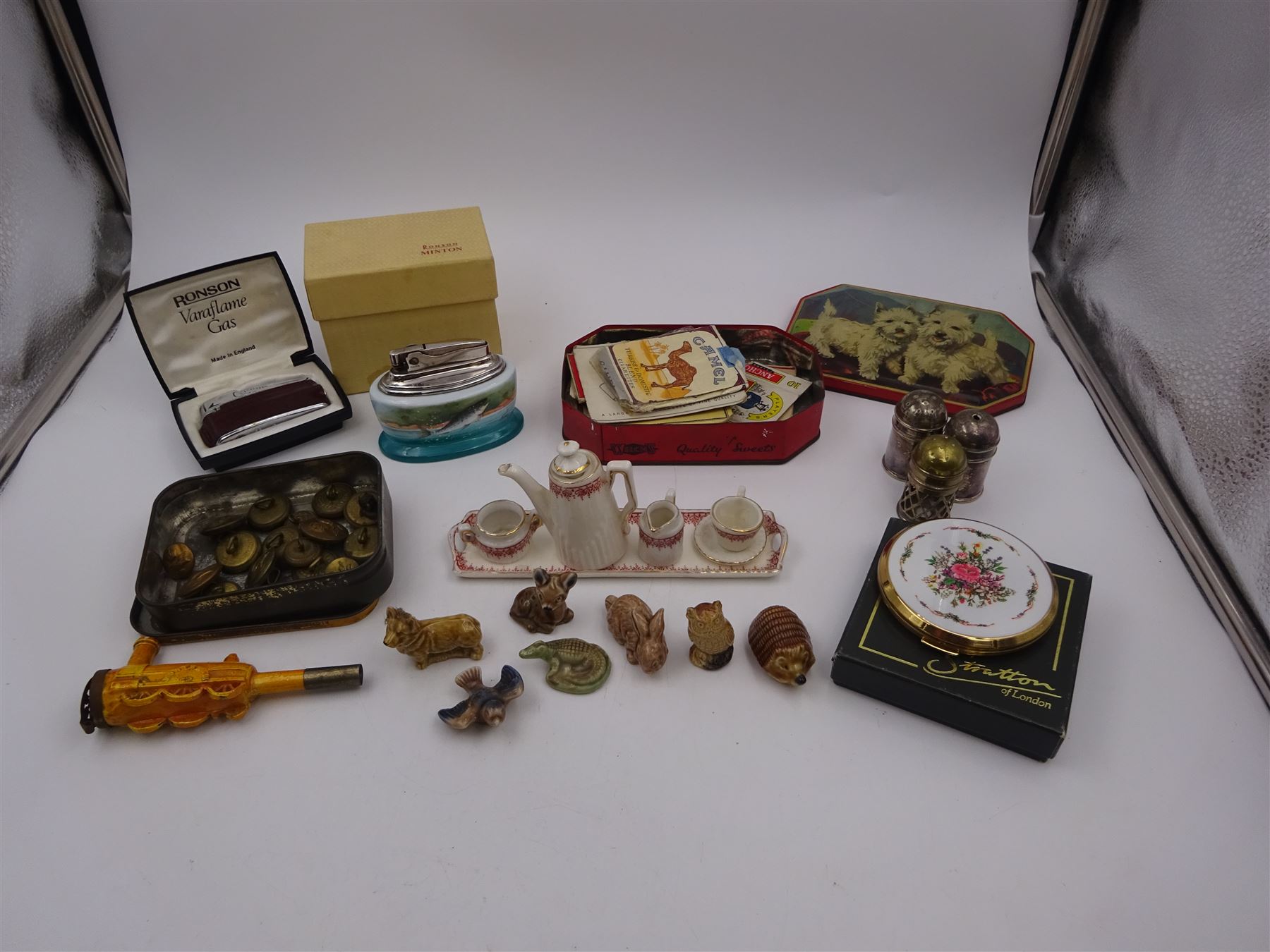 Minton table lighter decorated with a leaping salmon, signed T.Lee, with Ronson lighter mechanism, boxed, together with a Ronson Varaflame lighter, Stratton compact mirror, collection of Wade whimsies and a miniature Gemma teaset