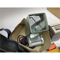 Quantity of Cameras , Lenses and Table Top Viewer- To be assessed 
Collection of cameras, lenses and photography equipment, to include Praktica EE2, Kowa SE, Kodak 66 model II, Inovar, lens Carl Zeiss Jena DDR Flektogon 2.4/35, lens Pentacon Electric f/2.8 135mm, Sunpak auto 2020, tripod  etc, together with a pair of Mark Scheffel 10x50 field binoculars.  