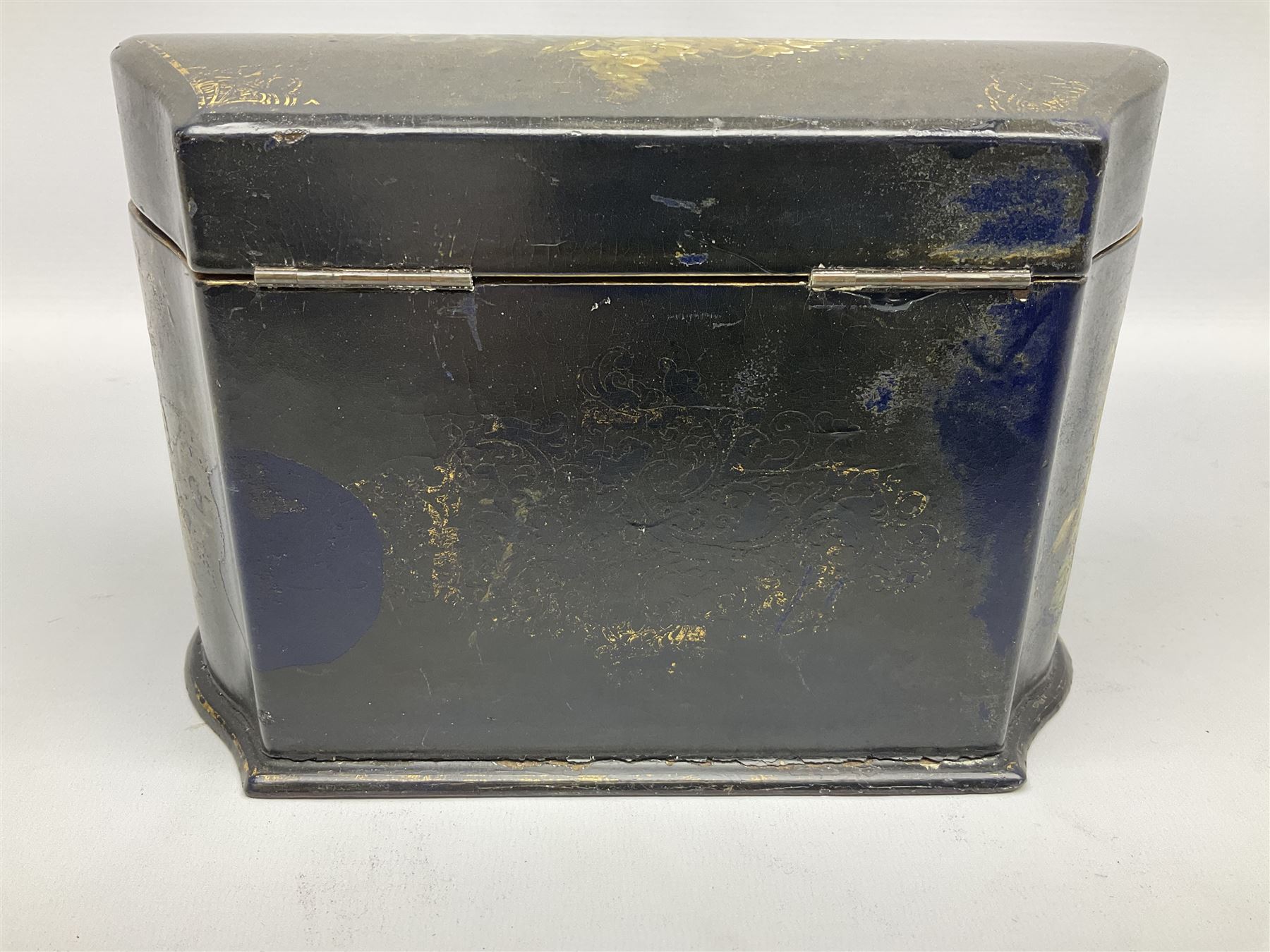 Victorian papier-mâché stationary box, of rounded wedge form with mother of pearl escutcheon, the hinged and curved cover and sides hand painted with floral sprays, opening to reveal a lined and fitted interior, H15cm L22cm D16cm