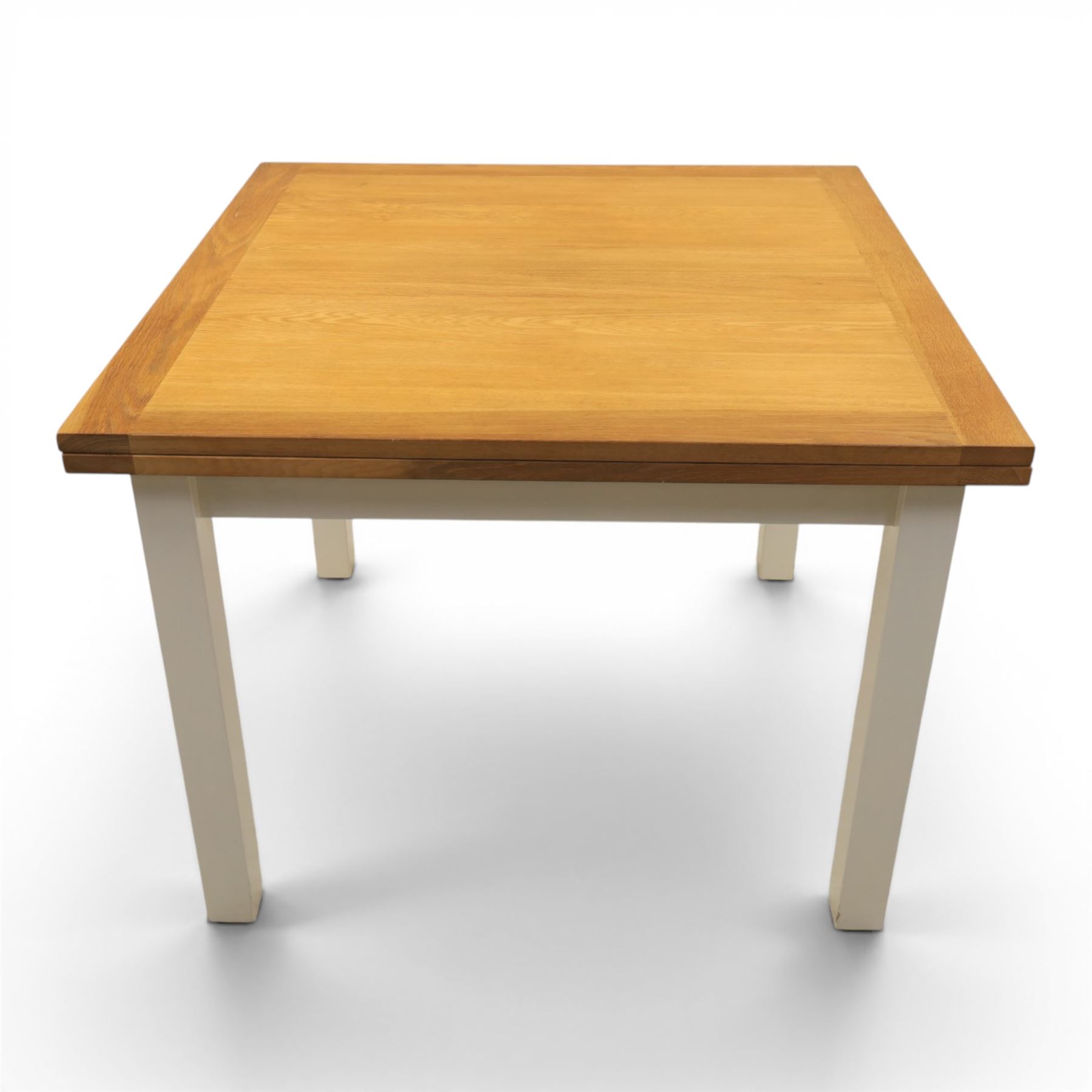 Contemporary Oak fold-over leaf dining table and four chairs, square top extending to a rectangular top 200cm, four white dining chairs with upholstered and padded seats