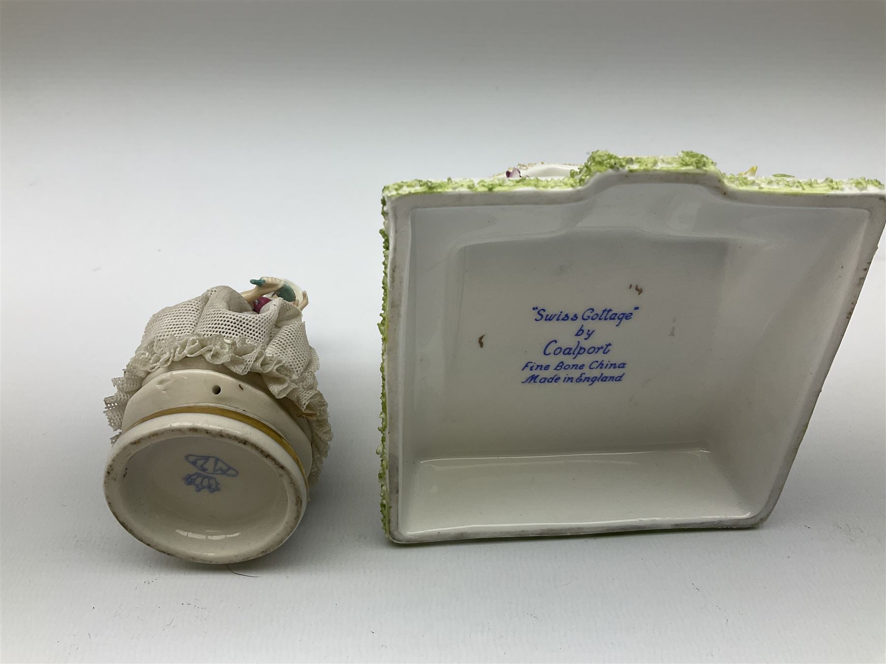 Group of figures, comprising six Royal Doulton examples, Daydreams HN1731, Silks and Ribbons HN2017, Tom Sawyer HN2926, Marie HN1370, Bo-Peep HN1811, and Tinkle Bell HN1677, together with a Dresden type 'lace' example, and a Coalport 'Swiss Cottage', (8)