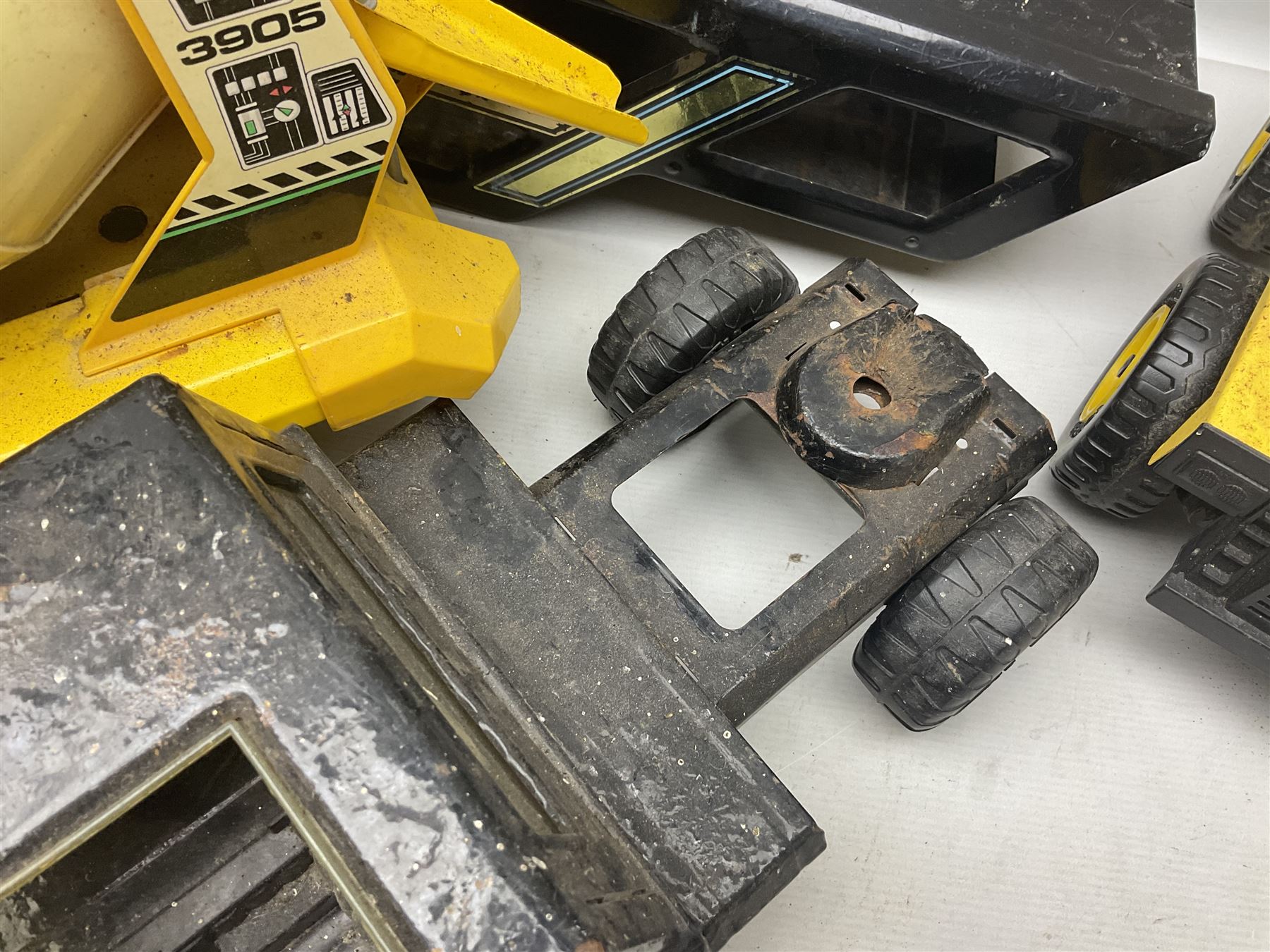 Tonka - five large scale steel pressed vehicles comprising Cement Mixer, Car Transporter, Mobile Crane and two Dumper Trucks (5)