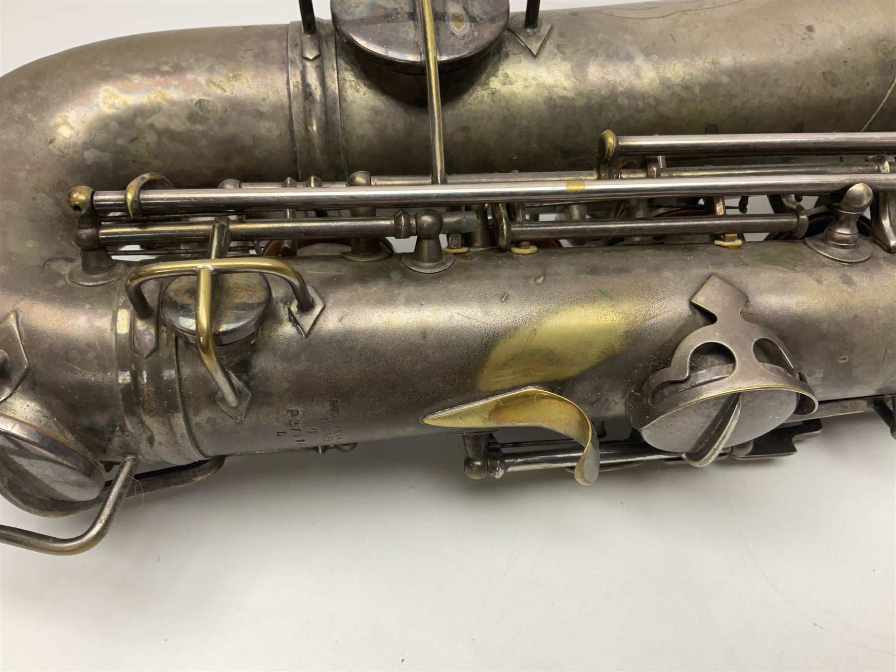 Early 20th century Elkhart Pan American C-Melody saxophone, Patd. Sept.14 1915, no.1153489, serial no.P27678; in fitted hard carrying case with crook