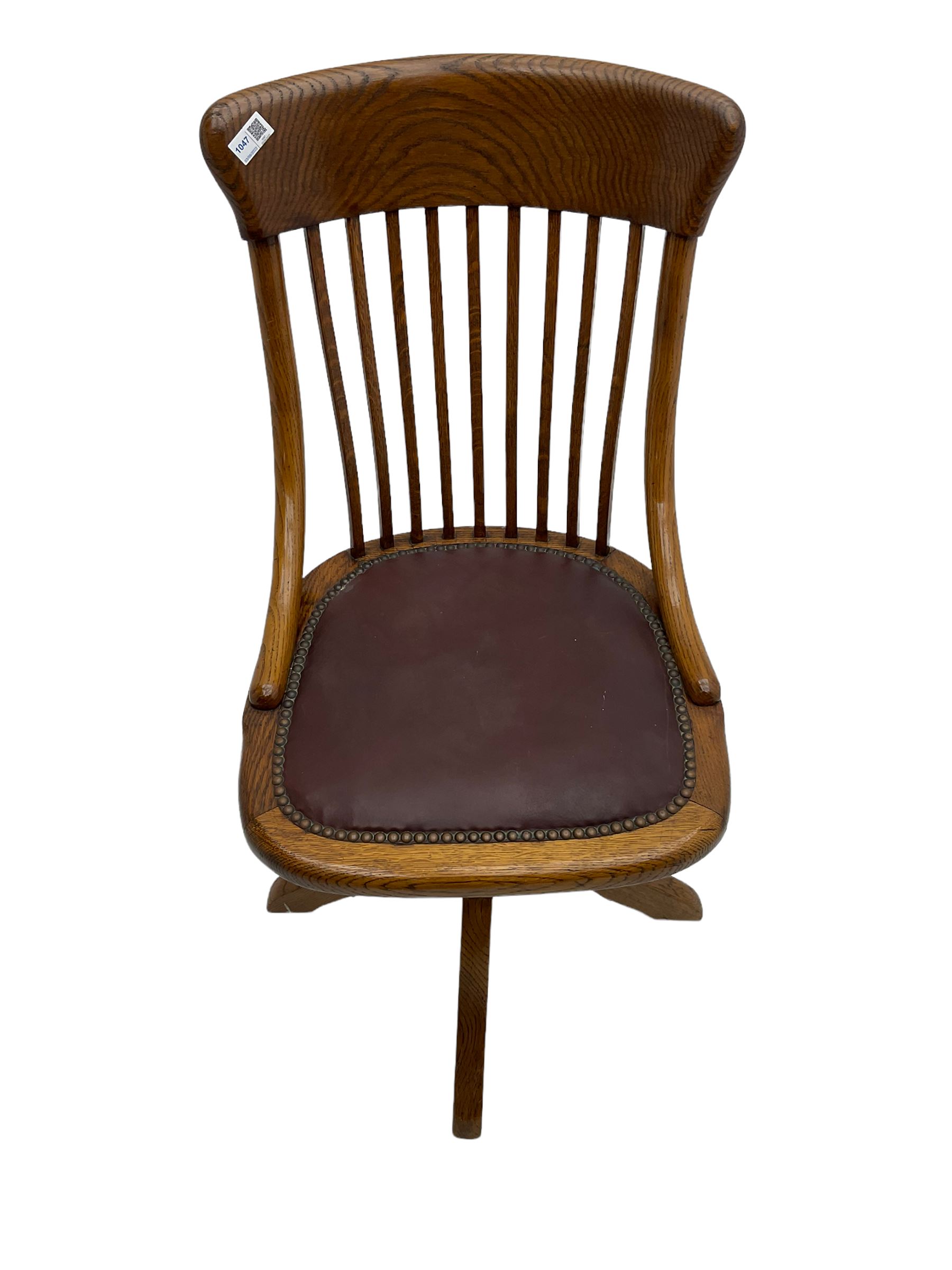 Early 20th century office oak adjustable swivel chair with studded leather seat