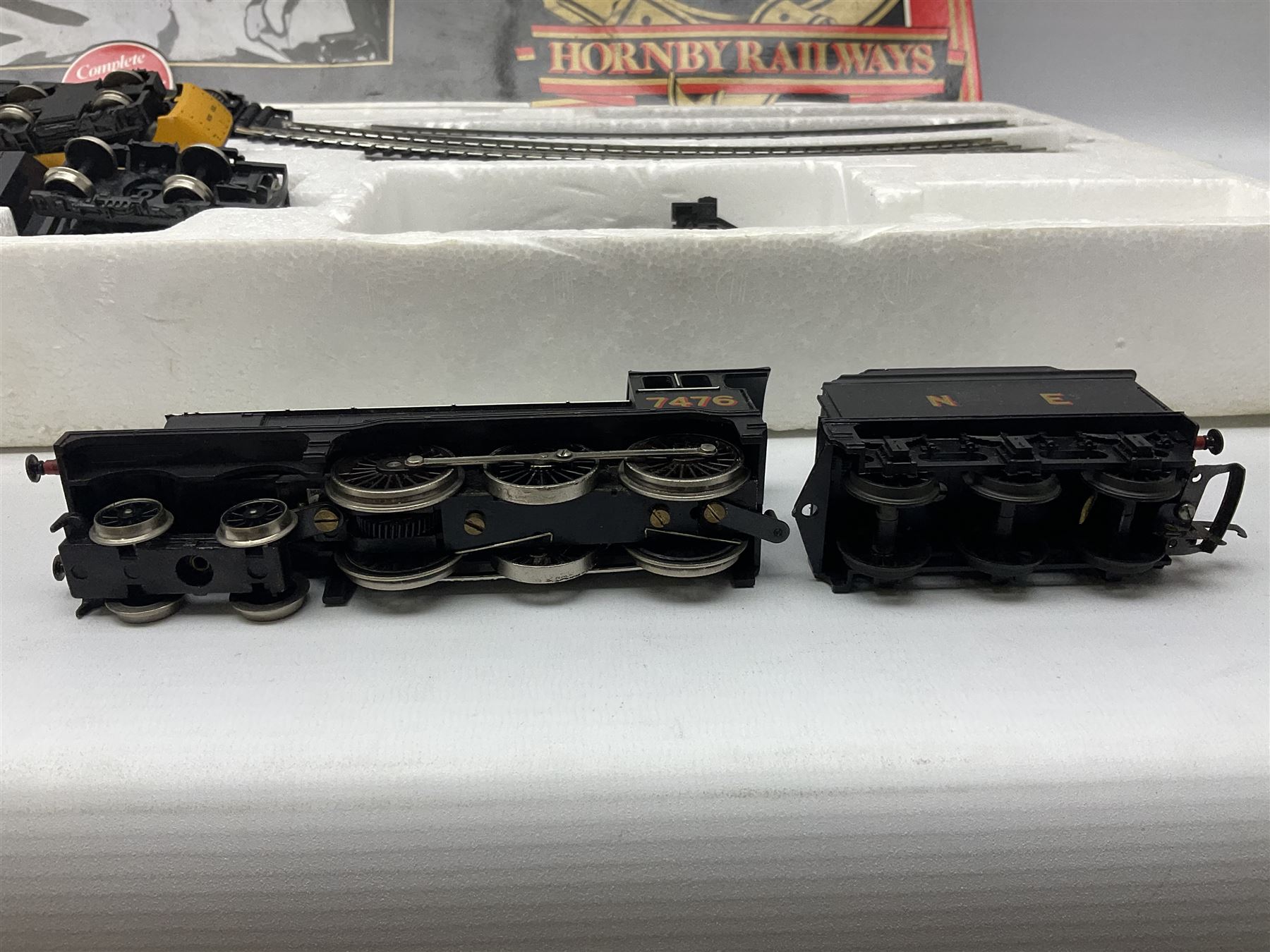 Hornby '00' gauge - Intercity 125 2-car set Nos.43010 & 43011 with one coach in original box with track and additional 4-6-0 locomotive and tender No.7476 and goods wagon; and another similar HST Intercity 125 2-car set Nos.43125 & 43126 with two coaches in original box with track and controller (2)