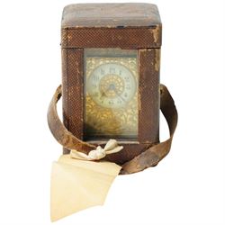 Late 19th century fretwork gilt brass carriage clock with white chapter ring in brass and ...