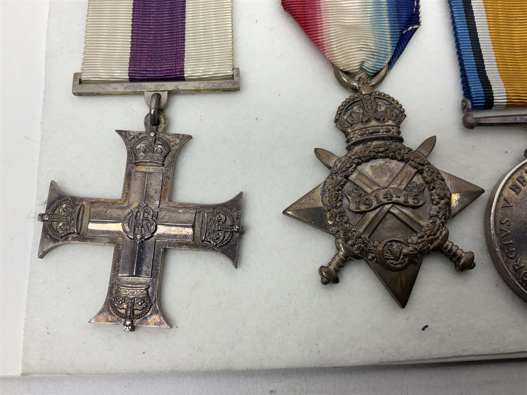 WWI Military Cross group of four awarded to Major Alfred Conrad Robinson South Lancashire Regiment and 3rd Battalion Nigeria Regiment Royal West African Frontier Force comprising MC, British War Medal and Victory Medal with oak leaf, and 1914-15 Star (to Lieut. A.C. Robinson); Military Cross London Gazette 4th June 1917. Bar to Military Cross (Capt. A.C. Robinson 3rd Bn. Nigeria Regt. RWAFF won a bar to his Military Cross (date of award 10th June 1917) for his action at Ngwembe German East Africa on 24th January 1917 for 'Handling his company with great judgement and coolness'. Recommended for a bar to his MC dated 10th June 1917 but never recorded (copy bar included with the medals).Mentioned in despatches on two occasions. Published in the London Gazette Supplements dated 31st May 1916 by Brig-Gen F.J. Cunliffe, commanding Allied Forces Northern Cameroons to the Rt.Hon. A. Bonar Law MP P.C. Secretary of State for the Colonies, H.Q. Nigeria Regiment, Lagos, 16th March 1916; and again London Gazette Supplement 7th March 1918 from Major-Gen A.R. Hoskins C.M.G. D.S.O. Late Commander-in-Chief East Africa Force to the Secretary of Stae for war 5th March 1918; together with an extensive archive of research information and the original bill of purchase from Spink & Son dated 4/11/1959