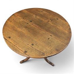 Georgian oak tripod table, plank top with visible dowels with turned baluster column, raised on cabriole supports