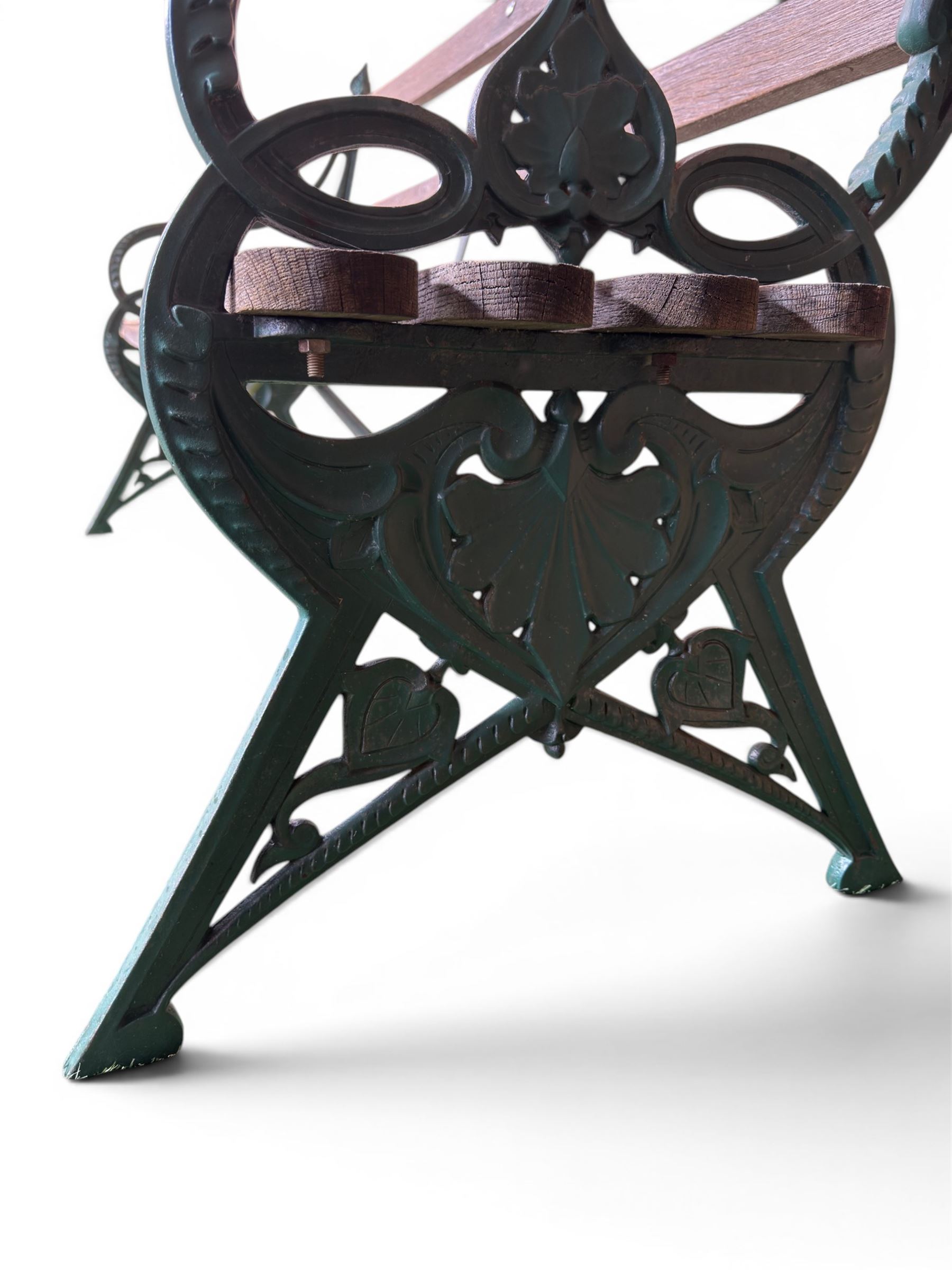 Coalbrookdale - Lily Pad design cast iron an wood slatted garden bench, late 19th century Aesthetic Movement, no. 217569, painted in green with iron centre support and seat stretcher, hardwood slatted