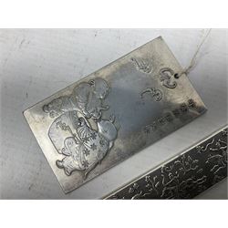Two Chinese white metal ingot plaques decorated with auspicious symbols
