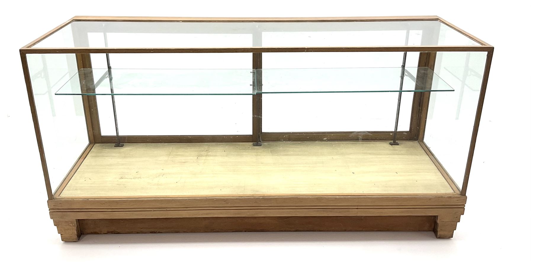 Mid century oak framed glazed display counter, two sliding doors, glazed shelves W182cm, H91cm, D61cm