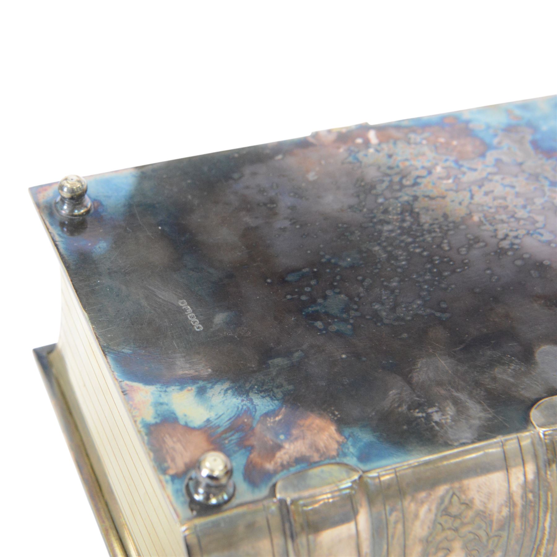 Late Victorian silver plated novelty biscuit box modelled as a presentation book, by Deykin & Sons, Birmingham, the spine engraved 'BISCUITS', the hinged cover with chased foliate decoration and mounted gilt bow secured by a gilt clasp with registration lozenge, opening to reveal a gilt interior with hinged scroll pierced grille, including bow H10.5cm W21.5cm D14.5cm