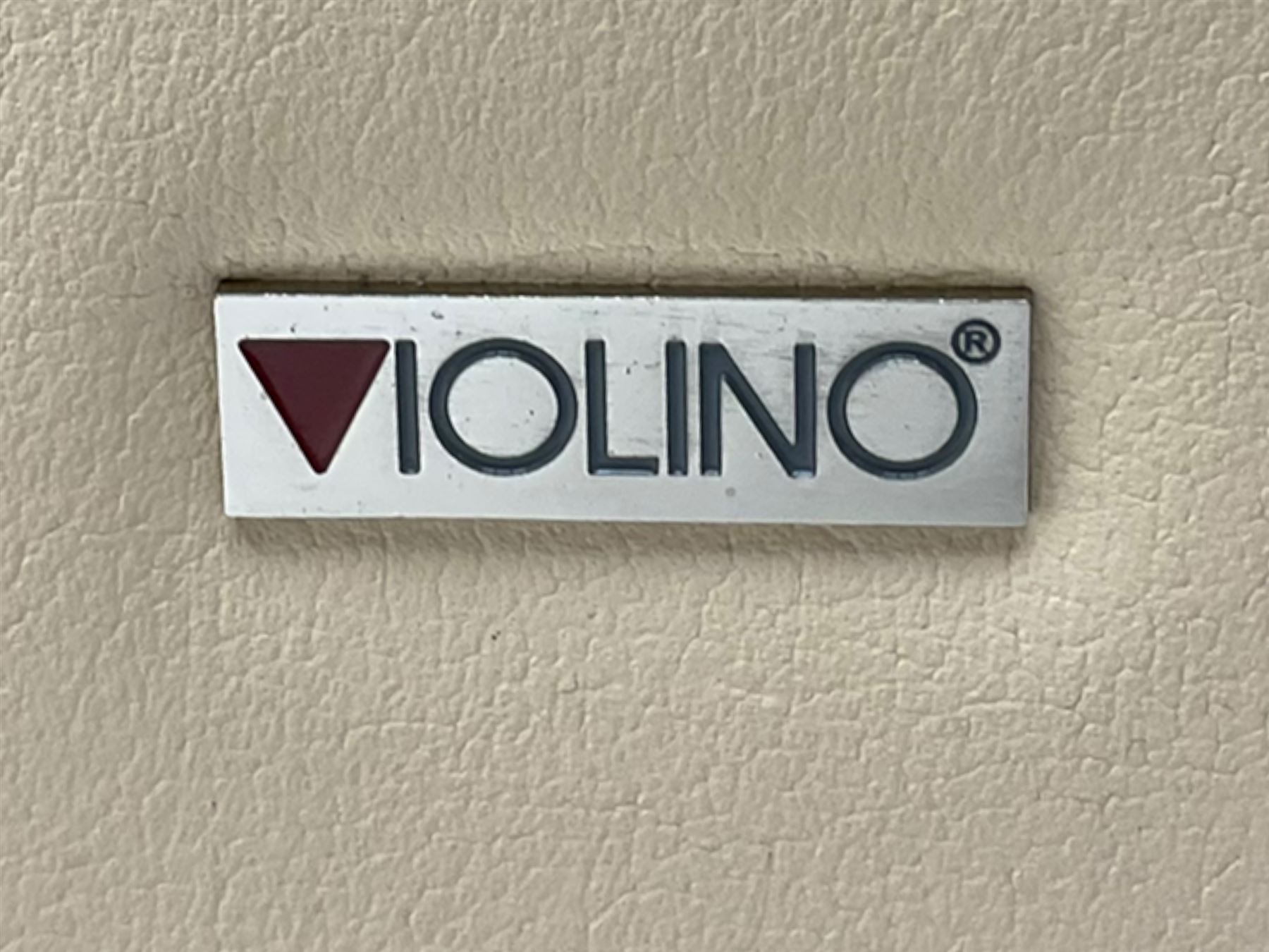 Violino Italian three seat sofa, upholstered in cream leather