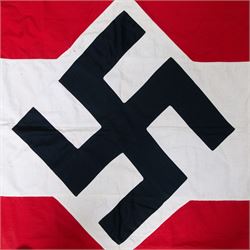 WWII German Third Reich Hitler Youth flag, with central swastika and later silver tress added to the edge