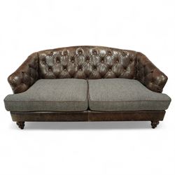 Tetrad - Harris Tweed and leather upholstered Chesterfield sofa, curved back and arms  with deep buttoned brown leather upholstery above loose herringbone tweed seat cushions with brown leather piping, raised on turned wooden feet 