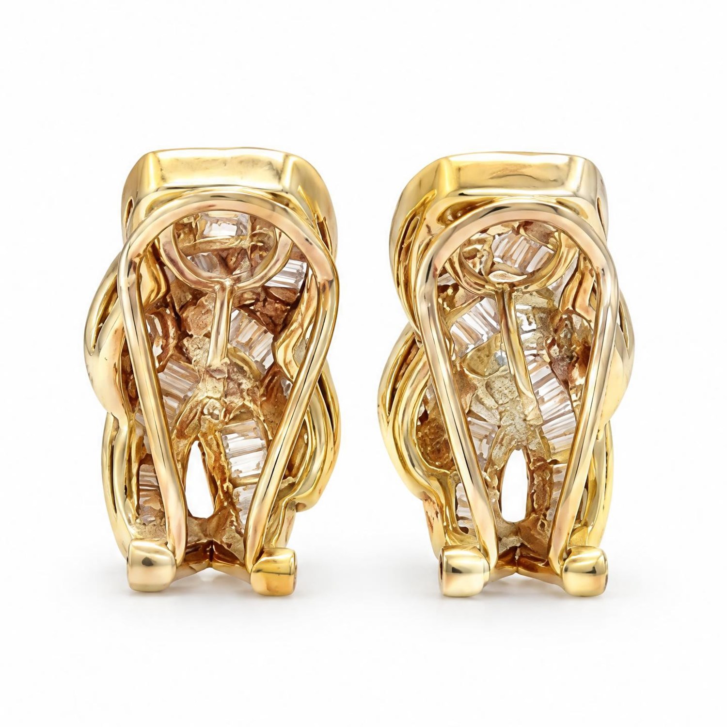Pair of 18ct gold baguette cut diamond earrings, each stud channel set with baguette cut diamonds, stamped K18, total diamond weight 1.16 carat