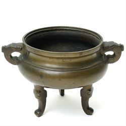 Chinese two handled bronze censer with impressed seal mark to base and on triple shaped su...