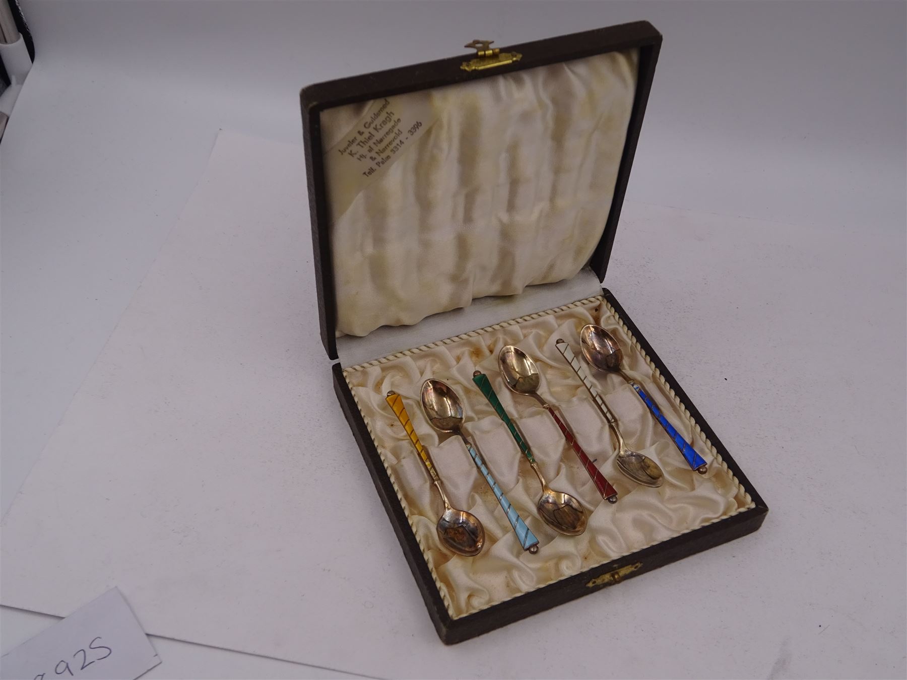 Set of six Danish silver gilt coloured guilloche enamel coffee spoons, each spoon with twist design enamel handle and ball finial, stamped Ela Denmark Sterling, in case