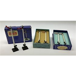 Hornby Dublo - twelve manually operated semaphore signals comprising one 5050 Signals Single Arm (D1) 2 Home, one 5060 Junction Signals (D3) 2 Home; D3 Junction Signal Upper Quadrant (1 Home 1 Distant); two 5055 Signals Double Arm (D2) 1 Home 1 Distant; two D2 Signals Double Arm (Upper Quadrant); three D2 Signals Double Arm Upper Quadrant Home - Distant; and two D1 Signals Single Arm Upper Quadrant; all boxed (12)