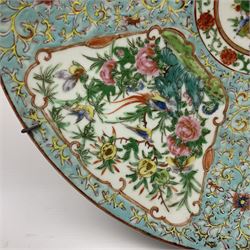 Late 19th/early 20th century Chinese Famille Rose charger, decorated in polychrome enamels with panels of birds amongst peonies, upon a celadon ground, D34.5cm