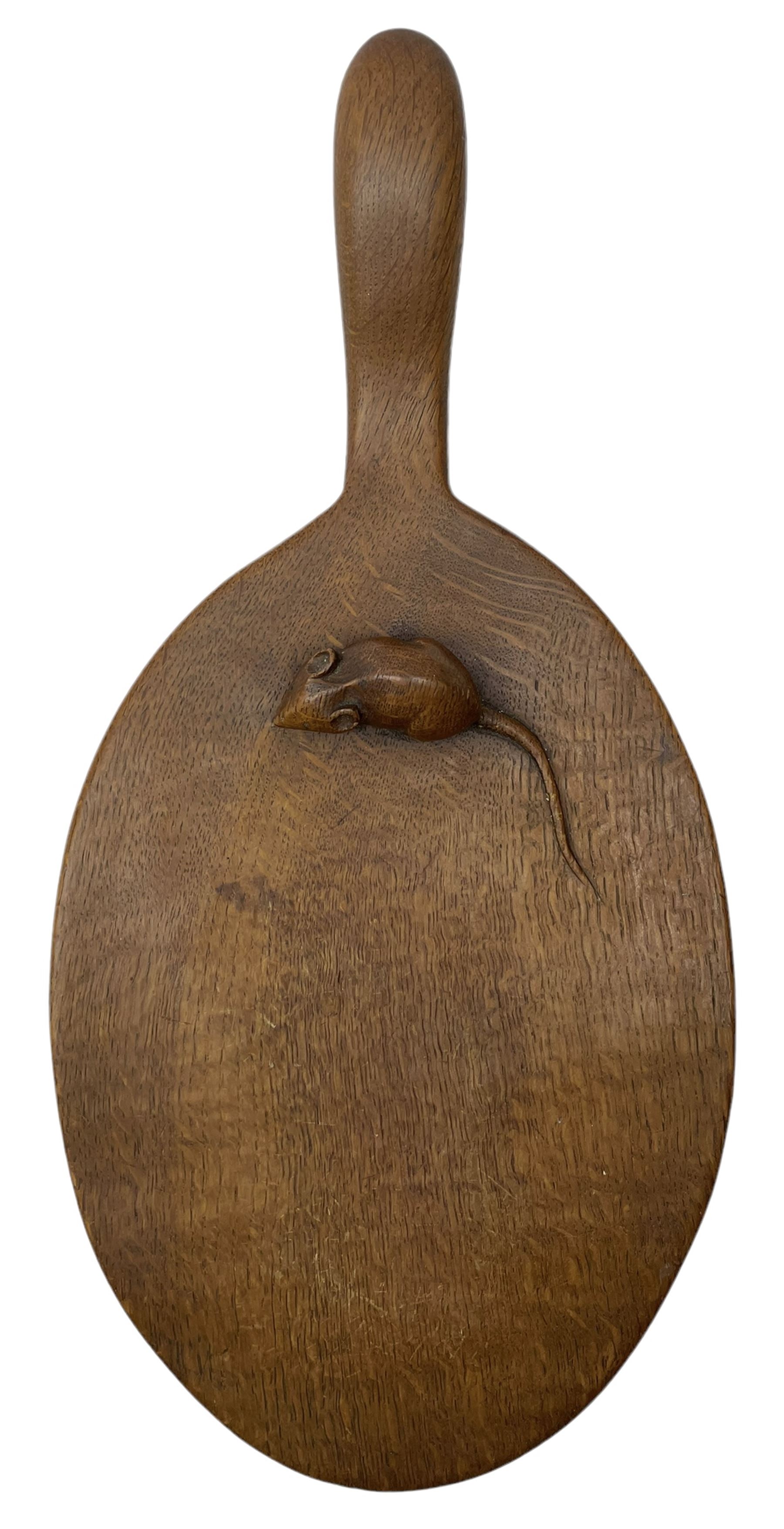 Mouseman - circa. 1940s/50s adzed oak cheese board, oval form with handle, the board carved with mouse signature, by Robert Thompson of Kilburn, L37cm D18cm 