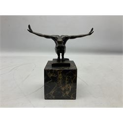 Bronze figure after Milo, a 'Power Of Silence', modelled as a male athlete crouched with arms outstretched upon a marble plinth, signed Milo, H15cm