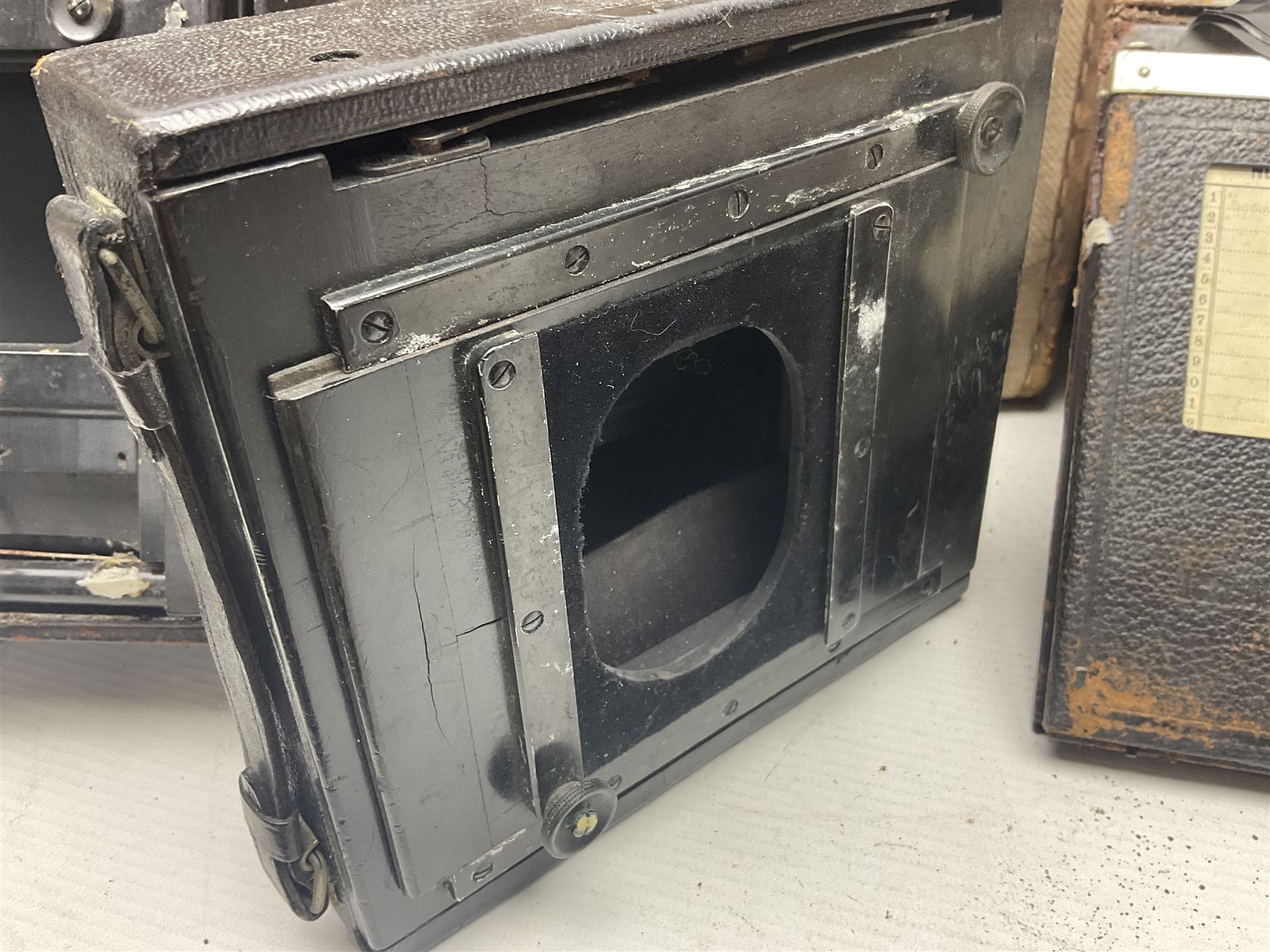 Contessa-Camera Werke folding camera, together with Hirrlinger folding camera, additional plates, two tripods and other accessories 