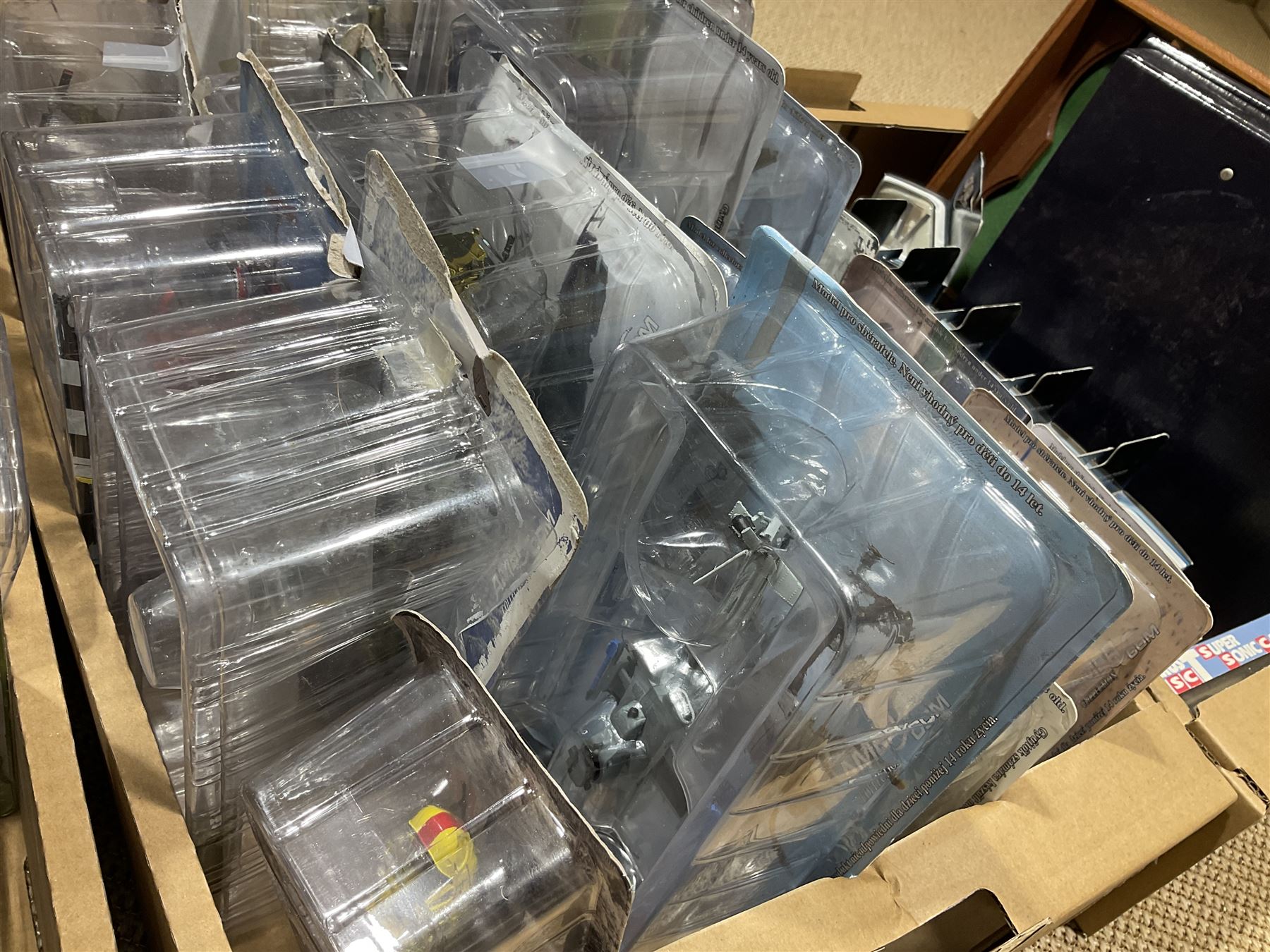 Thirty-six Amer Czechoslovakia periodical issued metal models of helicopters in original packaging; with thirty-nine issues of 'Helicopter Magazine' in two original binders; together with eight Corgi Collection die-cast military models; all boxed; and two others with small display rack; in three boxes