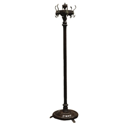  Edwardian oak hat and coat stand, with six lion mask cast brass scroll hooks and urn finial on lobed column support, stepped circular base on angular feet, H169cm  