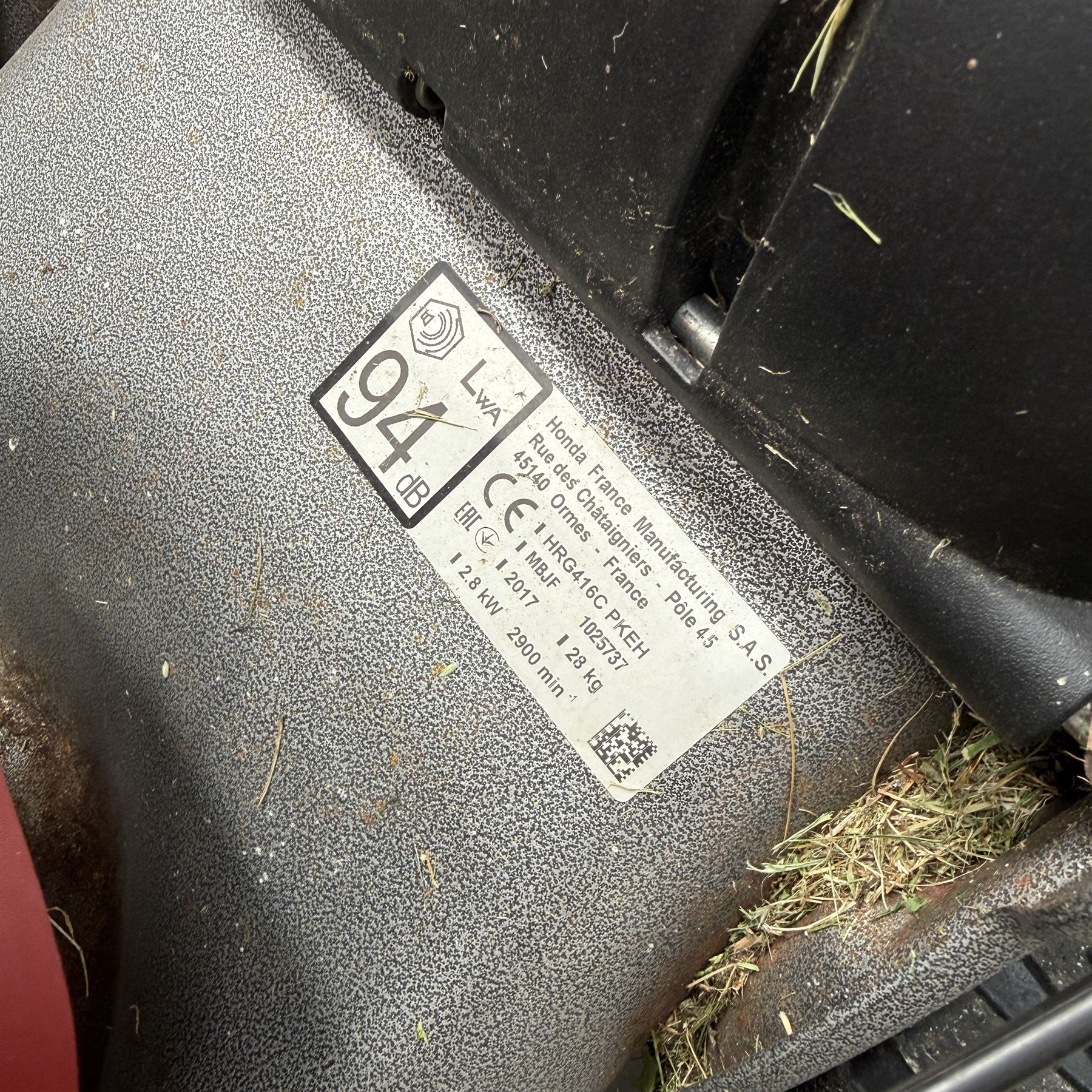 Honda -  GCV160 petrol lawnmower, Izy model, with rear grass collector, grey deck and red engine cover.