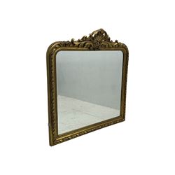 18th century design ornate gilt framed overmantle mirror, bevelled mirror plate within arched frame with pierced pediment featuring foliate and scrollwork designs