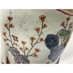 Large Japanese Imari porcelain figure, modelled as a Bijin, wearing a long kimono decorated with apple blossom and leafy branches on a white ground, with gilt detailing, possibly Edo period, H63cm