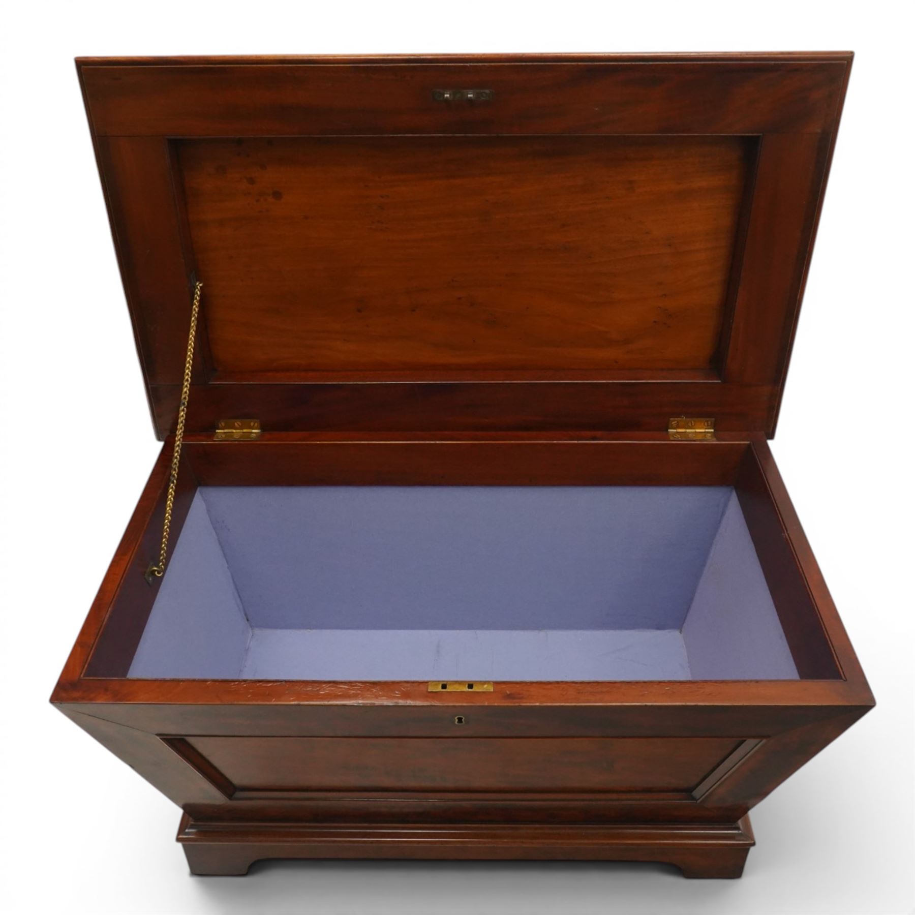 Thomas & George Seddon (1815-1870) - Pair of mid-19th mahogany cellarettes of sarcophagus form, the hinged and panelled top surmounted by a gadrooned and lappet carved knop, surrounded by a moulded edge, enclosing a lead lined wine cooler interior to one, the other paper lined, lower moulded edge over bracket feet and castors