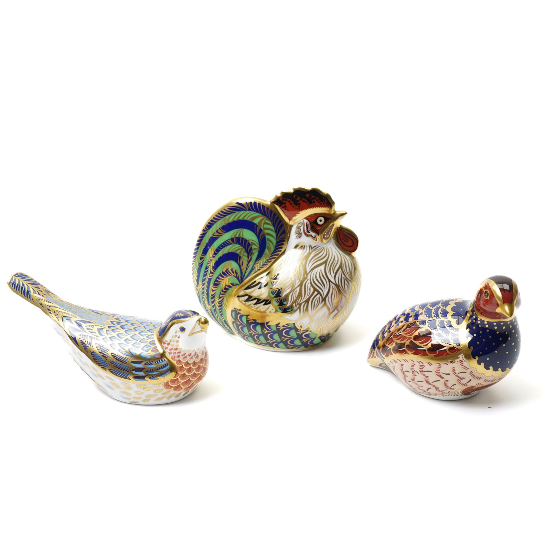 Royal Crown Derby paperweights, comprising Bluebird, Partridge, and Farmyard Cockerel, with gold stoppers, boxed (3)