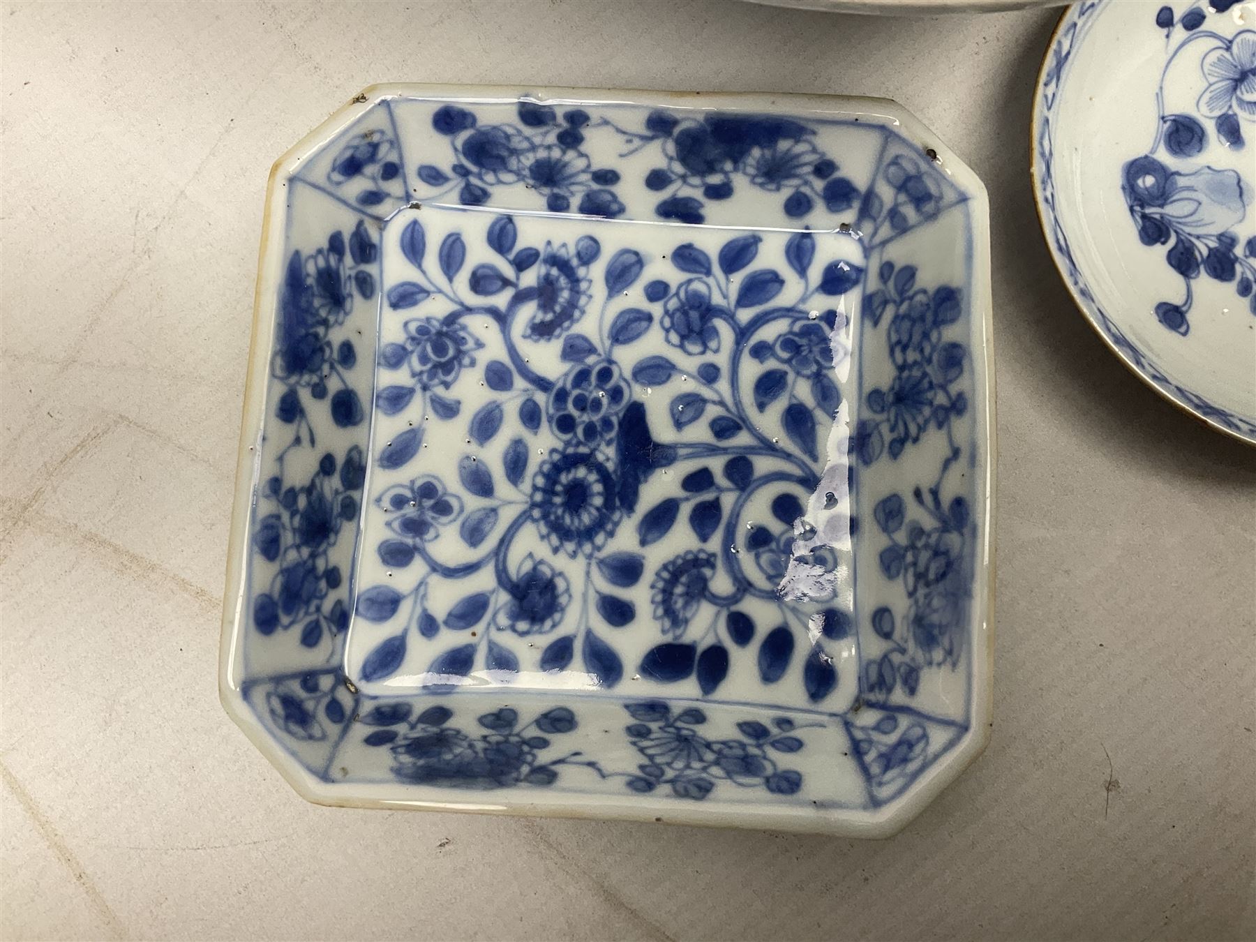 19th Century Imari pattern Japanese blood letting bowl, together with 19th century chinese blue and white square dish with decorated with blossoming flowers, together with thee blue and white saucers 